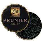 Prunier Tradition caviar tin opened with black French caviar pearls